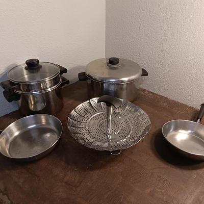Stainless steel pots and pans with a stainless steel steamer