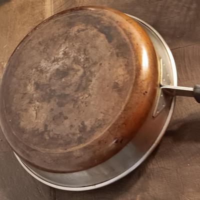 Stainless steel pots and pans with a stainless steel steamer