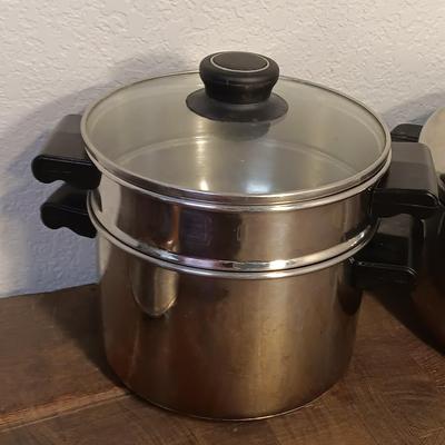 Stainless steel pots and pans with a stainless steel steamer