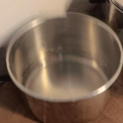 Stainless steel pots and pans with a stainless steel steamer