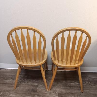Two dining room / kitchen chairs in good and sturdy condition