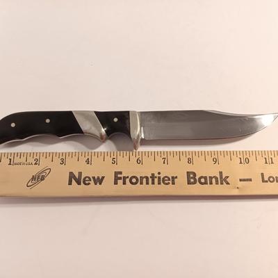 Beautiful knife with leather sheath marked Wind River Knives Dubois, Wyoming