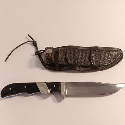 Beautiful knife with leather sheath marked Wind River Knives Dubois, Wyoming