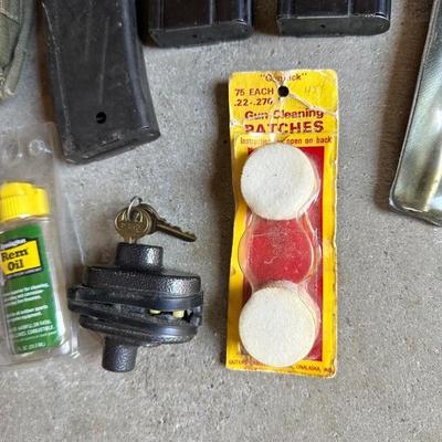 TRIGGER LOCK, GUN CLEANING MATERIAL, SAFETY GLASSES, EAR PROTECTION, MAGAZINES, MAGAZINE POUCHES AND AMMO BOXES