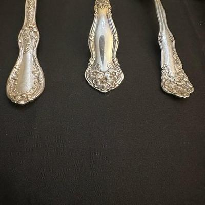 Group of Beautifilly Detailed Spoons and Forks