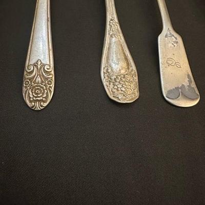 Group of Beautifilly Detailed Spoons and Forks