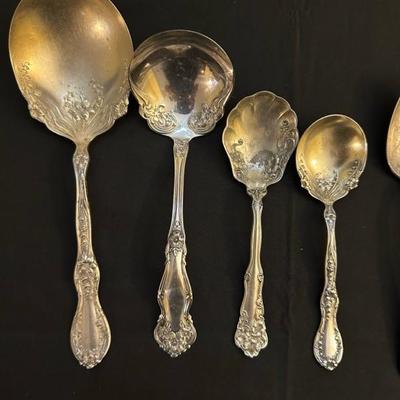 Group of Beautifilly Detailed Spoons and Forks