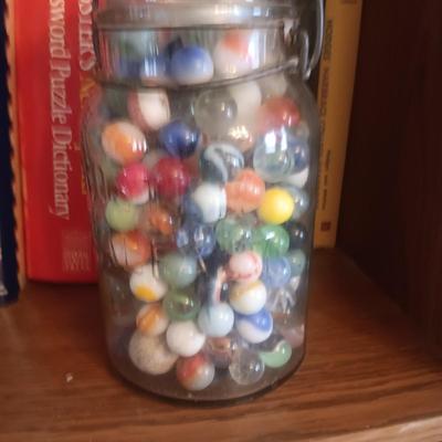 A QUART SIZE CANNING JAR FILLED WITH VINTAGE MARBLES