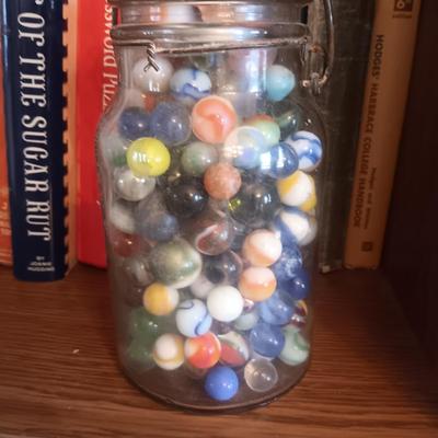 A QUART SIZE CANNING JAR FILLED WITH VINTAGE MARBLES