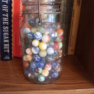 A QUART SIZE CANNING JAR FILLED WITH VINTAGE MARBLES
