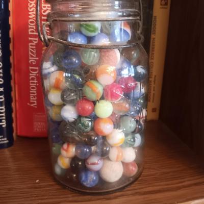 A QUART SIZE CANNING JAR FILLED WITH VINTAGE MARBLES