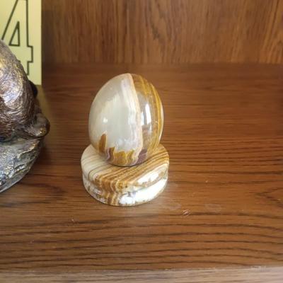 STATUE OF A GIRL AND CAT, MARBLE EGG, AVON COLOGNE HORSE AND AN AGATE