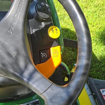 JOHN DEERE 4 Rivers X 580 with 54" Accel Deep Deck with John Deere Tiller, John Deere Snow Blower, and Yardworks Lawn Sweeper