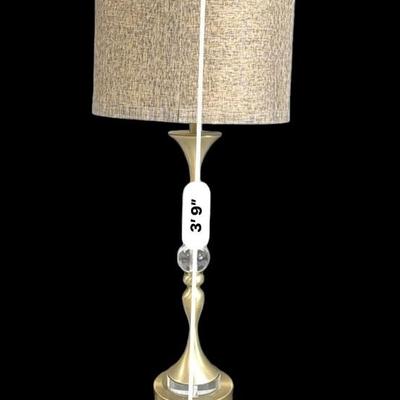 Champagne colored metal floor lamp