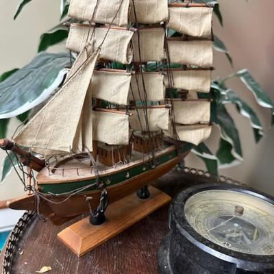 Model ship and vintage Chelsea gauge