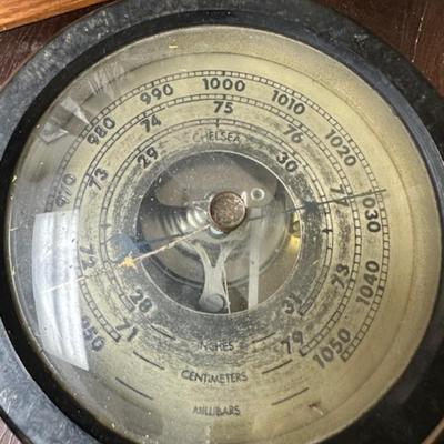 Model ship and vintage Chelsea gauge