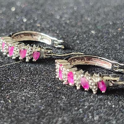 Rubies and Diamonds set in 14K white gold earrings