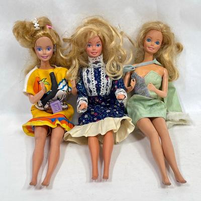 Three vintage Barbies Mickey Mouse dress, Prairie Dress, Cocktail Dress