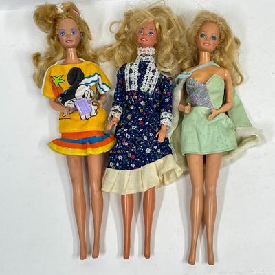 Three vintage Barbies Mickey Mouse dress, Prairie Dress, Cocktail Dress