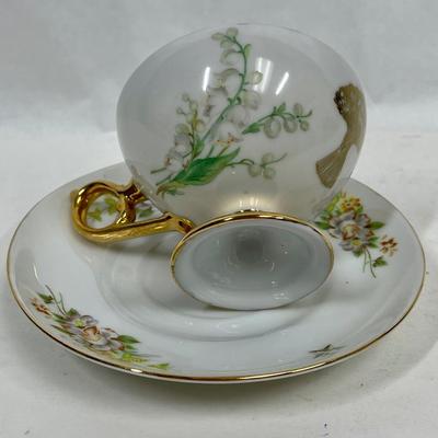 Teacup and saucer, star in cup