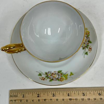 Teacup and saucer, star in cup