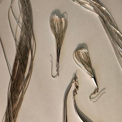 Multi strand liquid silver necklace with pendant, and earrings
