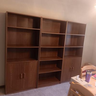 3 SECTION SHELVING UNITS WITH CABINETS ON 2