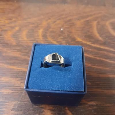 STERLING SILVER RING W/A DARK STONE