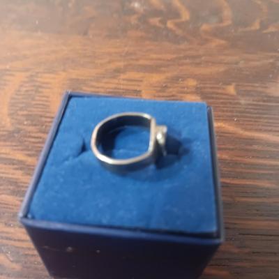 STERLING SILVER RING W/A DARK STONE