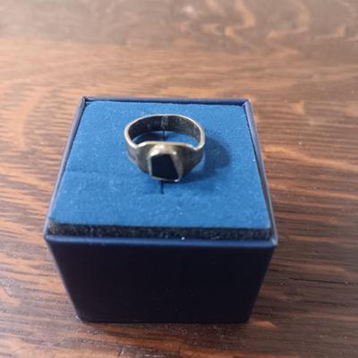 STERLING SILVER RING W/A DARK STONE