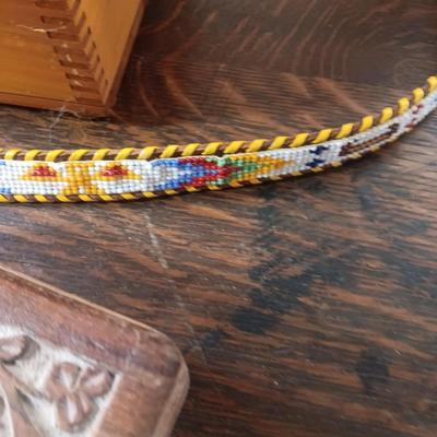 2 WOODEN BOXES AND A HAND BEADED BELT