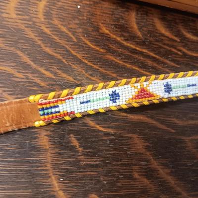 2 WOODEN BOXES AND A HAND BEADED BELT