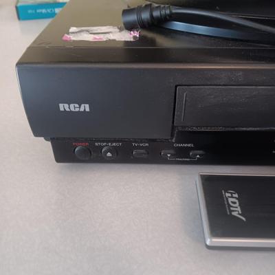 SYLVANIA 19" TV AND RCA VHS PLAYER