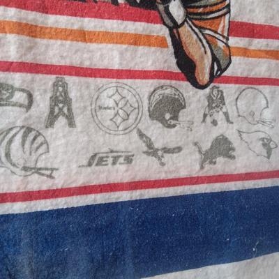 TWIN SIZE NFL FOOTBALL BLANKET AND JOHN ELWAY ON A BOX OF SEALED WHEATIES CEREAL