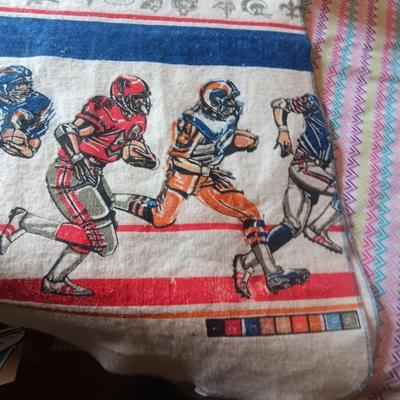 TWIN SIZE NFL FOOTBALL BLANKET AND JOHN ELWAY ON A BOX OF SEALED WHEATIES CEREAL