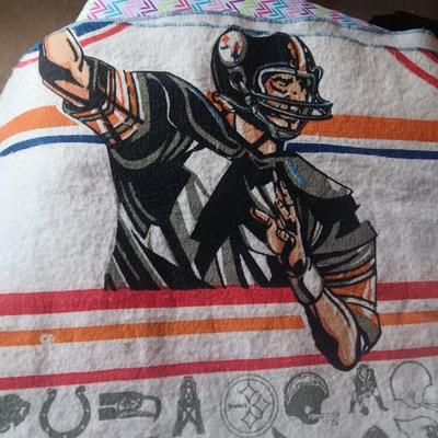 TWIN SIZE NFL FOOTBALL BLANKET AND JOHN ELWAY ON A BOX OF SEALED WHEATIES CEREAL