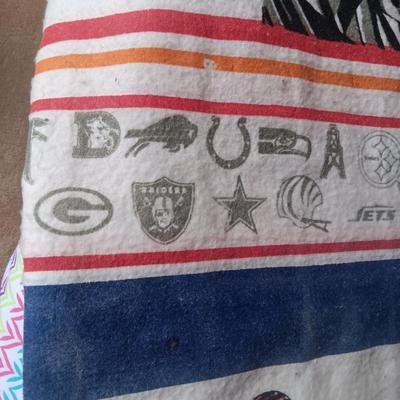 TWIN SIZE NFL FOOTBALL BLANKET AND JOHN ELWAY ON A BOX OF SEALED WHEATIES CEREAL