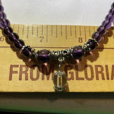 Vintage Amethyst Bead Stretch Necklace 28" Long in Very Good Preowned Condition.