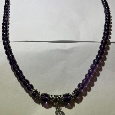 Vintage Amethyst Bead Stretch Necklace 28" Long in Very Good Preowned Condition.