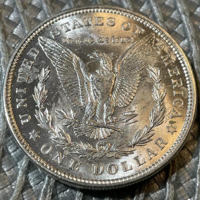 1921-P UNCIRCULATED CONDITION MORGAN SILVER DOLLAR (COIN #1) AS PICTURED.