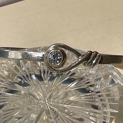 Vintage Sterling Silver CZ Standard Size Bangle Bracelet that Opens at the CZ in Good Preowned Condition.