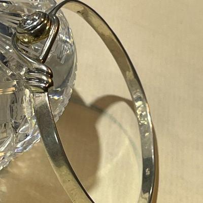 Vintage Sterling Silver CZ Standard Size Bangle Bracelet that Opens at the CZ in Good Preowned Condition.