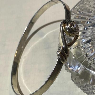 Vintage Sterling Silver CZ Standard Size Bangle Bracelet that Opens at the CZ in Good Preowned Condition.