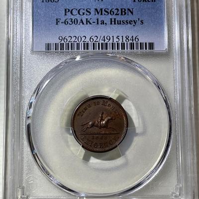 PCGS Certified Scarce 1863 Token F-630AK-1a, Hussey's NY Token, MS62 Brown Nice Original Example as Pictured.