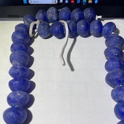 Vintage 29" African Krobo Recycled Glass Blue Donut Beads 1" Wide on a Leather Cord as Pictured. Very Heavy Beads.