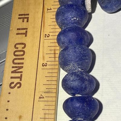 Vintage 29" African Krobo Recycled Glass Blue Donut Beads 1" Wide on a Leather Cord as Pictured. Very Heavy Beads.