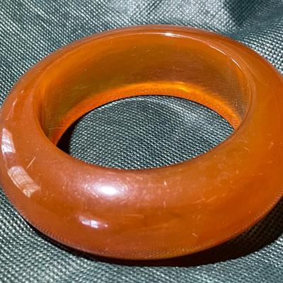 Vintage Translucent Amber Color Heavy 1" Wide Bangle Bracelet in Good Preowned Condition.