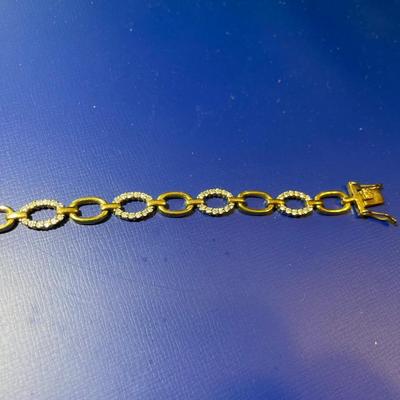 Vintage Sterling Silver Gold-toned CZ Tennis Bracelet 7-1/4" Long in Good Preowned Condition.