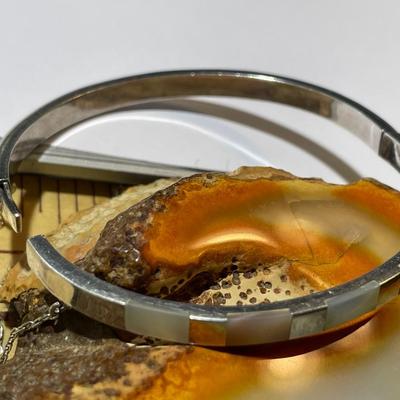 Vintage Sterling Silver Inlaid Mother of Pearl Bangle Bracelet Standard Size in Good Preowned Condition.