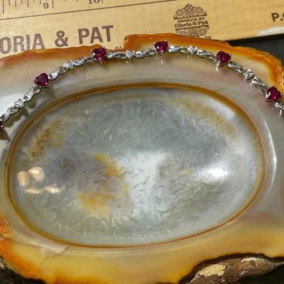 Sterling Silver .925 Dainty Heart Shaped Red Stones Bracelet 7-1/2" Long in VG Condition.